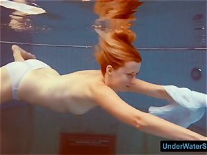 redhead in a milky dress and mind-blowing swimsuit